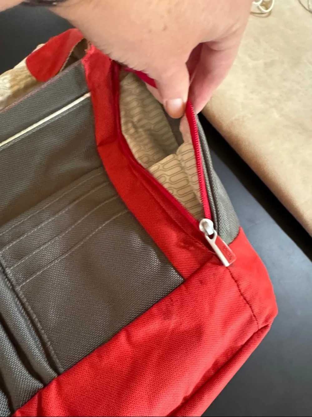 Tumi Red Messenger Bag with Gray Accent. Expandable. Laptop section.